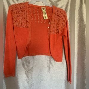 Vibrant orange with goldish-dust